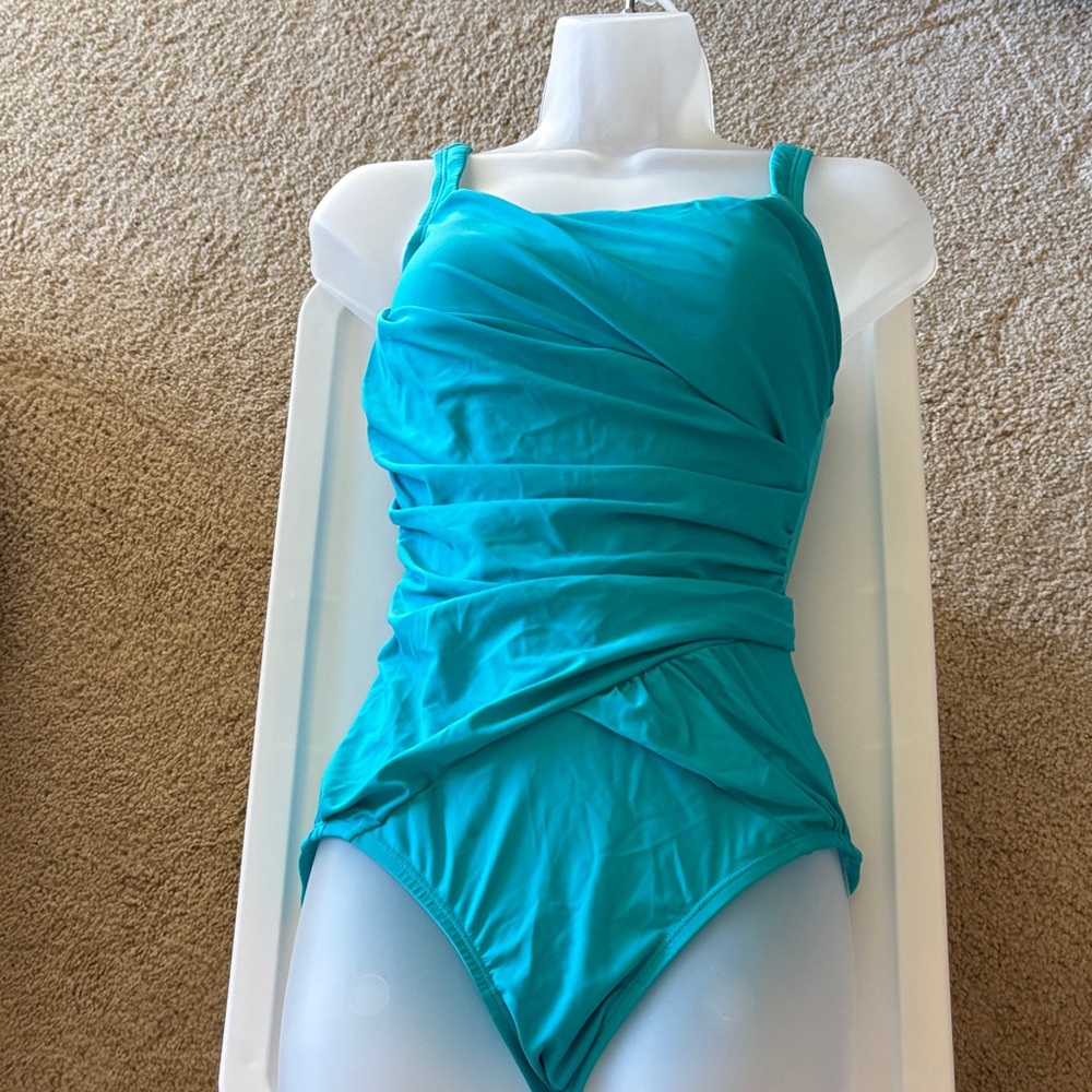 SPANX Swim One Piece in Aqua Blue. Brand new. Never worn.